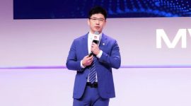 Arthur Wang delivering a keynote speech